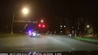 Car Runs Red Light In Front Of Cop