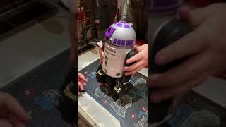 Mom builds her droid at Droid Depot| Hollywood Studios Galaxy’s Egde