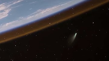GREEN COMET seen from the Space Station