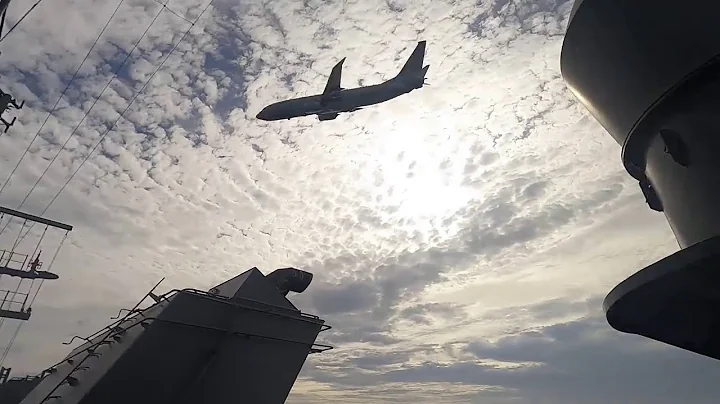 US Navy P-8A Poseidon low pass over USS America (LHA 6)