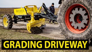 Grading A FIELD Road With An AG trailed Grader