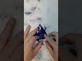 This blue glitter paper makes the PERFECT origami lily!#origami #origamilily #origamiflower