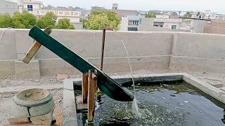 water Powered Pounder corn mill live