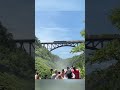 World’s largest working steam train rolls through Genesee River Arch Bridge on Thursday
