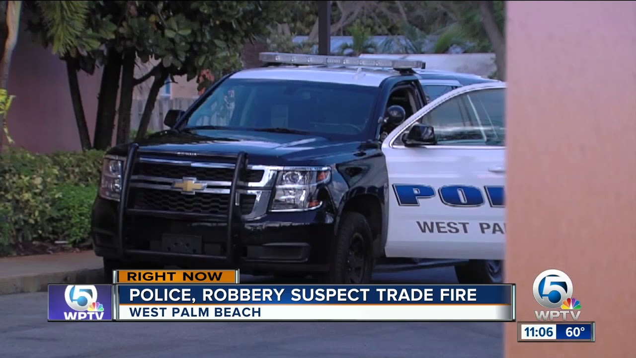 West Palm Beach officer, robbery suspect exchange gunfire - YouTube