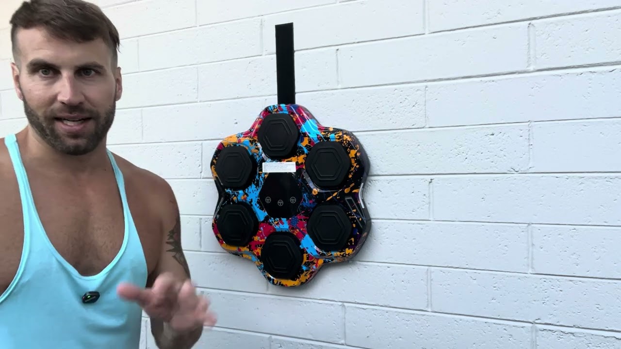 JUOIFIP Muziek Boksmachine met Bokshandschoenen, Muurmontage Bluetooth Muziek Boxer, Thuistraining Digitale Boksmuur Doelwit Punching Apparaat Pads Geschikt voor Kinderen en Volwassenen (Roze Blauw