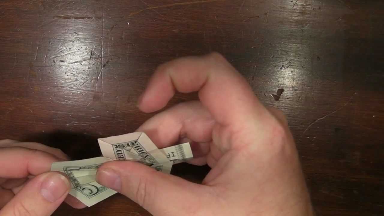 Origami Cross With A Us Five Dollar Bill - 