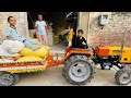 Mini tractor 5911 fully loaded trolly wheat flour bags hmt 5911 mini tractor homemade mini tractor