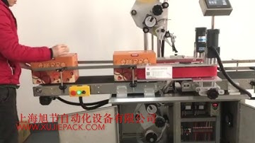 Labeling machine for top and bottom of carton