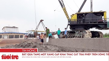Bắt quả tang một xáng cạp khai thác cát trái phép trên sông Tiền