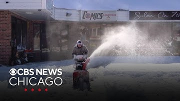 Chicago area digs out from unusually early first heavy snowfall of the season
