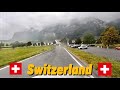 Driving from maienfeld switzerland to zurich in cloudy and rainy weather