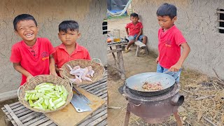 Adorable 2 brother cook food for diner , rural life little chef