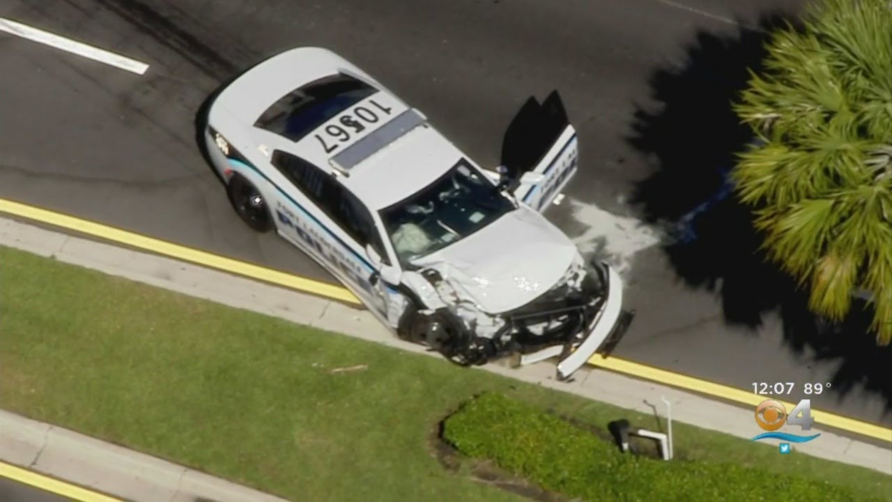 Fort Lauderdale Officer Hospitalized In Cruiser Crash - YouTube