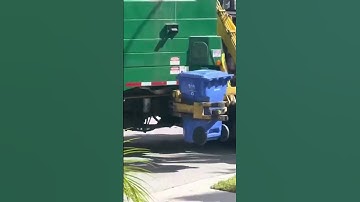 WM recycling truck collects plastic and bottles