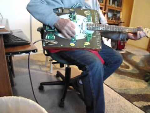 john-deere-tractor-guitar..using-vintage-metal-john-deere-sign..