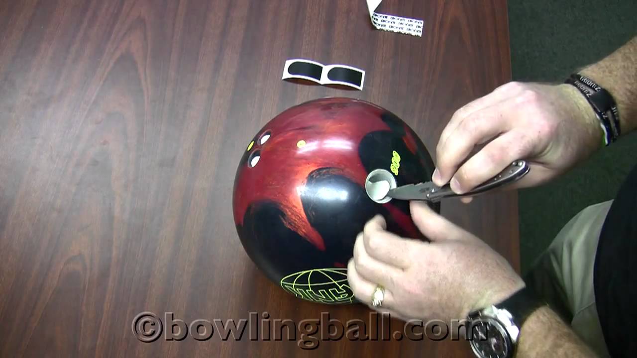 How To Insert Thumb/Finger Tape in Your Bowling Ball - BowlVersity Video by bowlingball.com