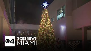 Holiday cheer as Nicklaus Children’s Hospital lights Christmas tree with snow and celebration