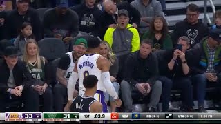 Russell Westbrook and Bucks fan exchange words