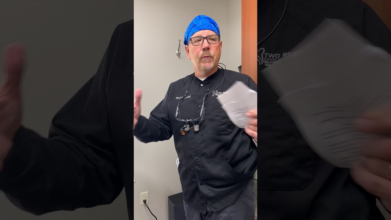 Dr. Chris Hansen demonstrates COVID-19 safety equipment