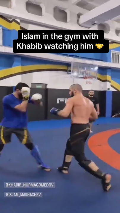 Khabib watching Islam Makhachev in the gym (via nurmagomedov_mma_school/IG)