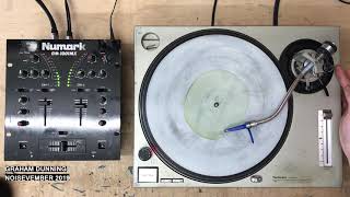 Noisevember 2019 Day 5: Kiwi fruit clock face on a record player