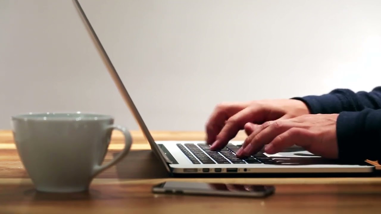 Man Typing on Laptop - ROYALTY FREE VIDEO - HD