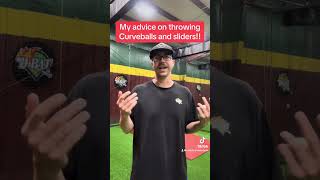 Baseball pitcher development advice on throwing curveballs and sliders