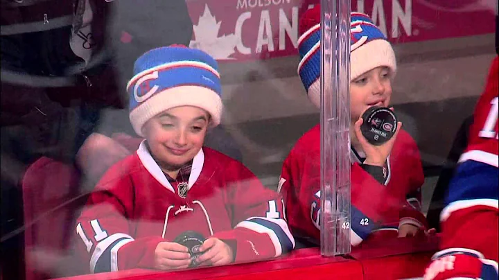 Gotta See It: Adorable fans getting pucks, Hab-in a good time