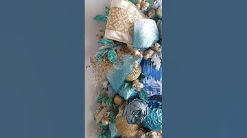 Elegant glam aqua jeweled holiday swag wreath