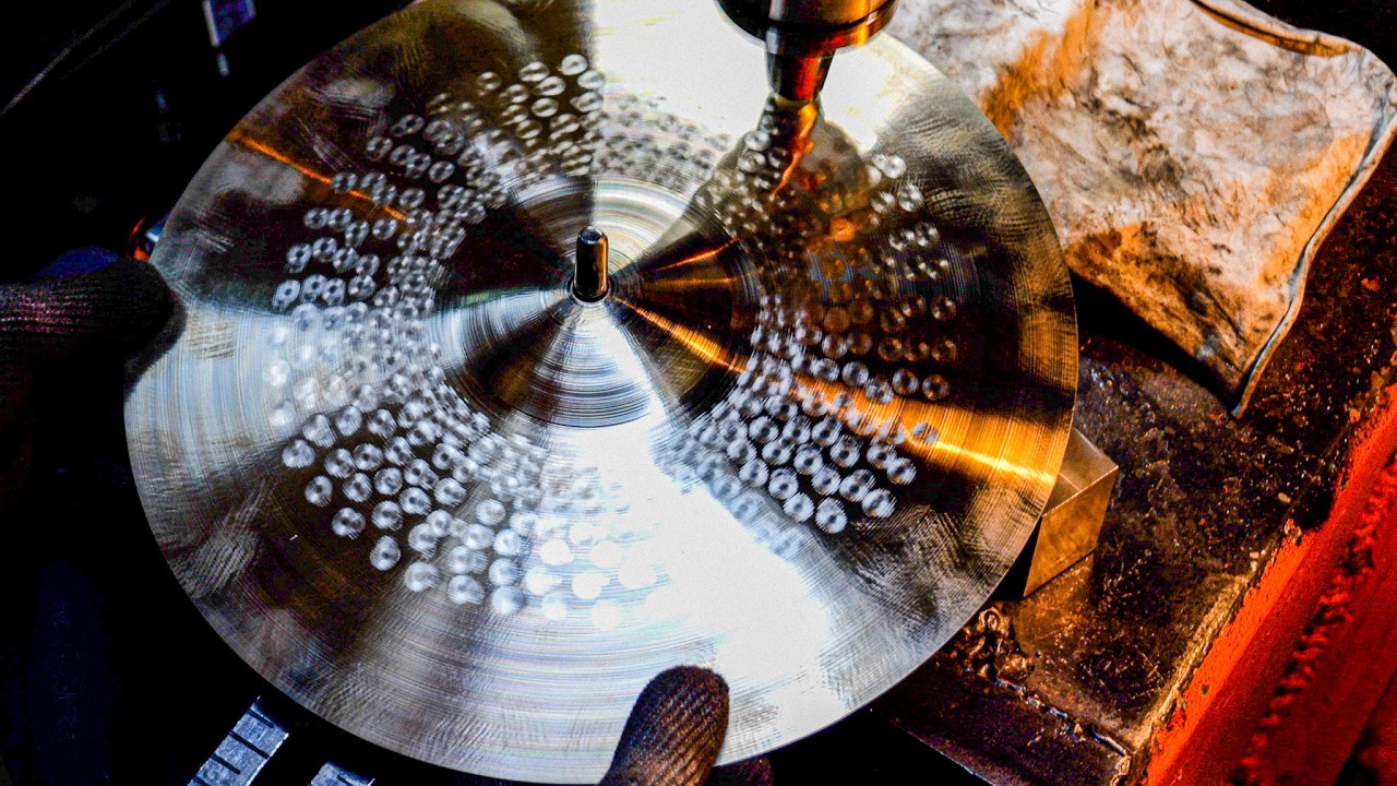Making cymbal instruments.Manufacturing the only cymbal maker in