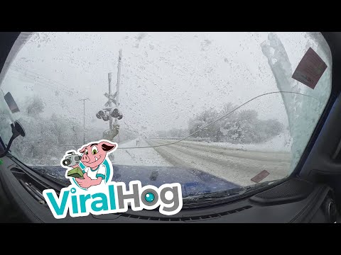 Jeep Has a Close Call on Icy Roads || ViralHog