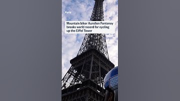 Mountain biker Aurelien Fontenoy breaks world record for cycling up the Eiffel Tower