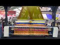 High speed double width rapier loom with double beam