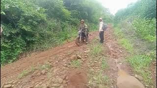 Tourists walking to visit Bunong Indigenous traditional house at Purotang Village.