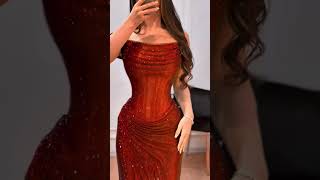 To order this red crystal gown DM A sculpted off-shoulder corset gown in rich ruby sequins,