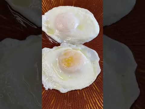 Should over easy eggs be flipped once or twice?