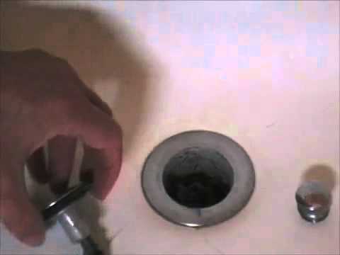 cleaning-a-bathtub-drain-with-a-lift-and-turn-stopper