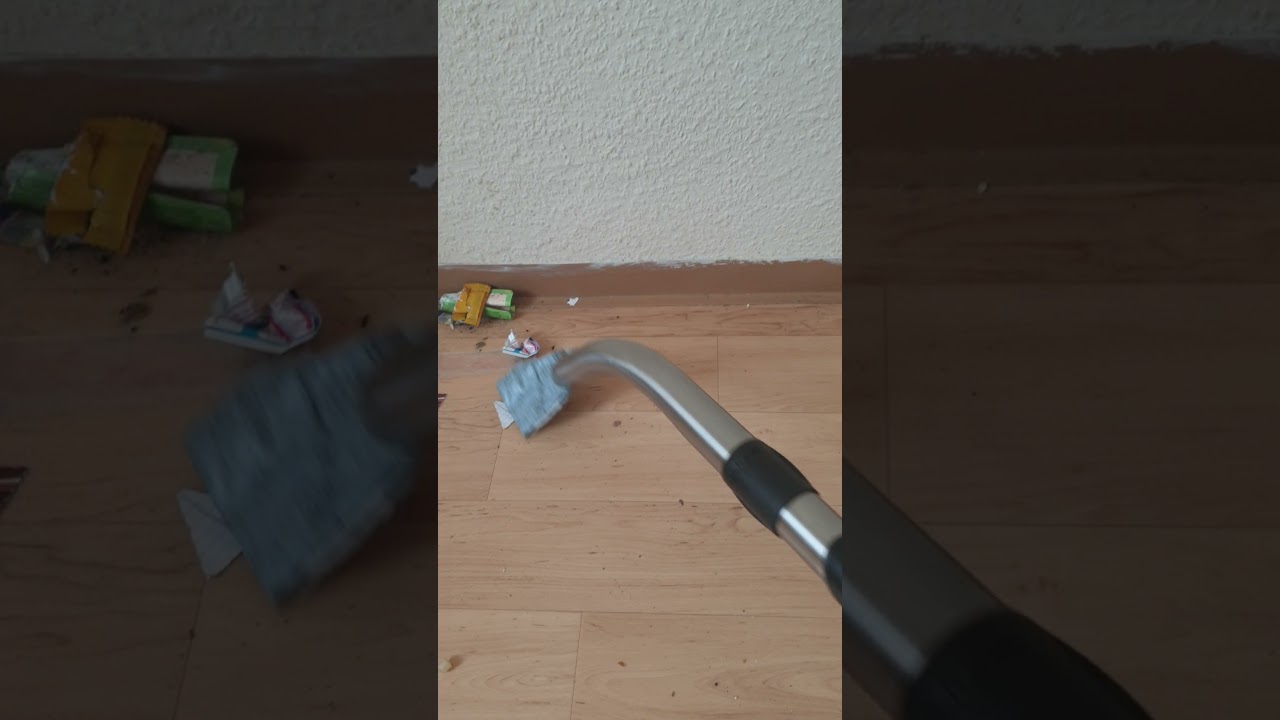 Henry Hoover vacuuming a big pile of Dirt in a messy room (lego,socks,paper and more)
