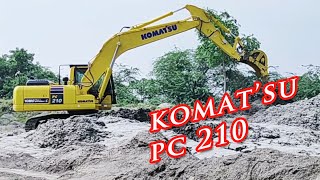 Komatsu Pc210 Back To An Action Truck Street