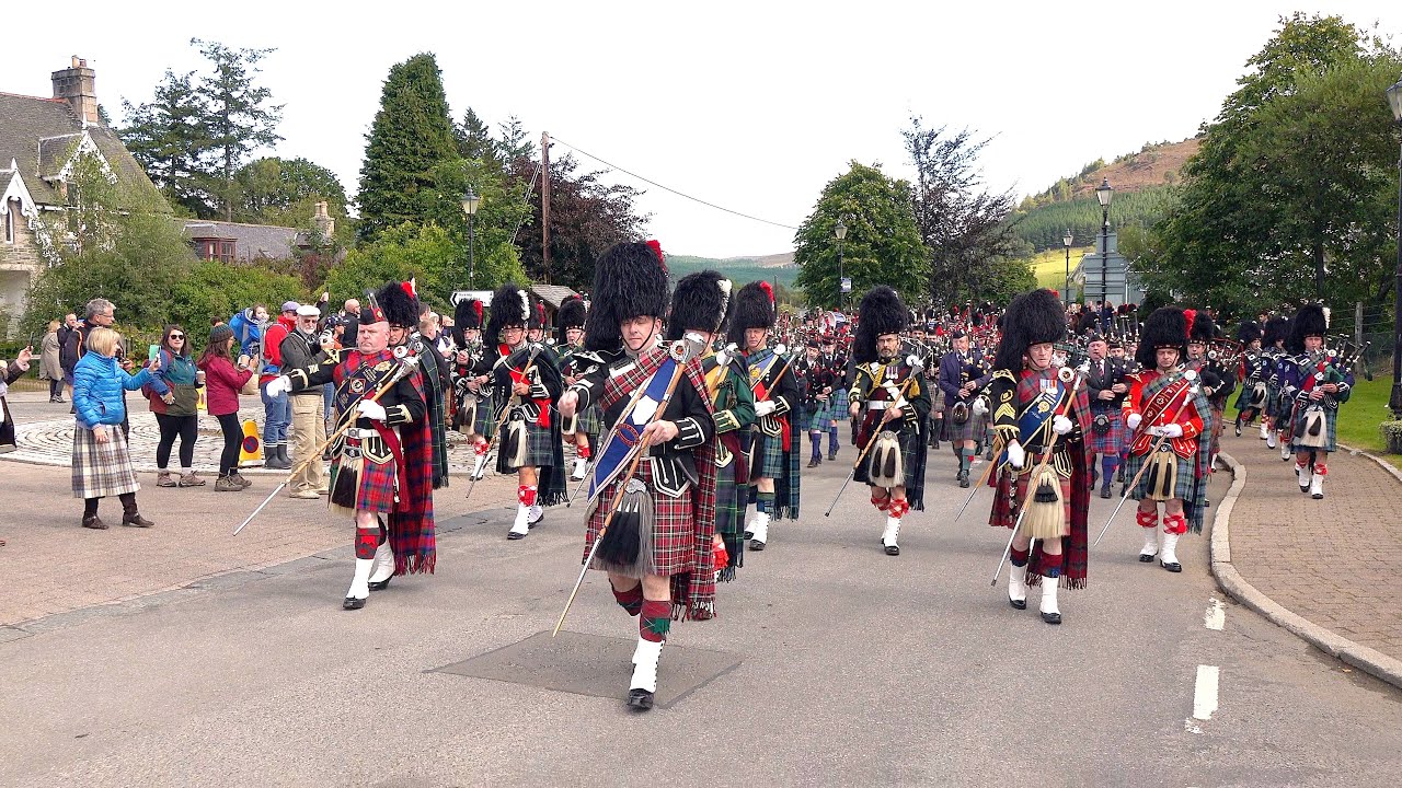 Drum Major Roland Stuart leads the massed bands into the 2019 Braemar