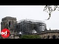 Notre-Dame: Fire under control as Macron pledges to rebuild