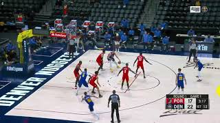 Nikola Jokic clears out the side for himself and goes to work on Kanter in the post