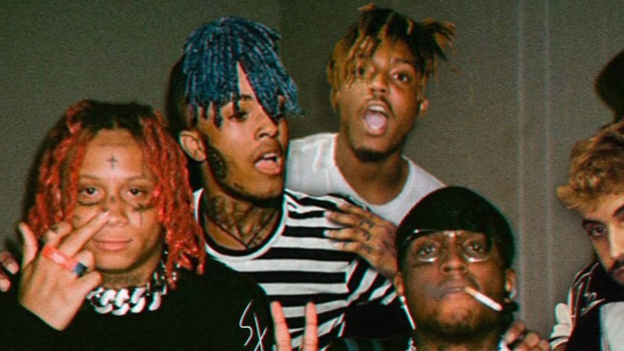 WHAT'S ON THE STAR? on X: Juice WRLD Rocks Red Balaclava with a Suit in  Bad Boy Video Read more:    / X