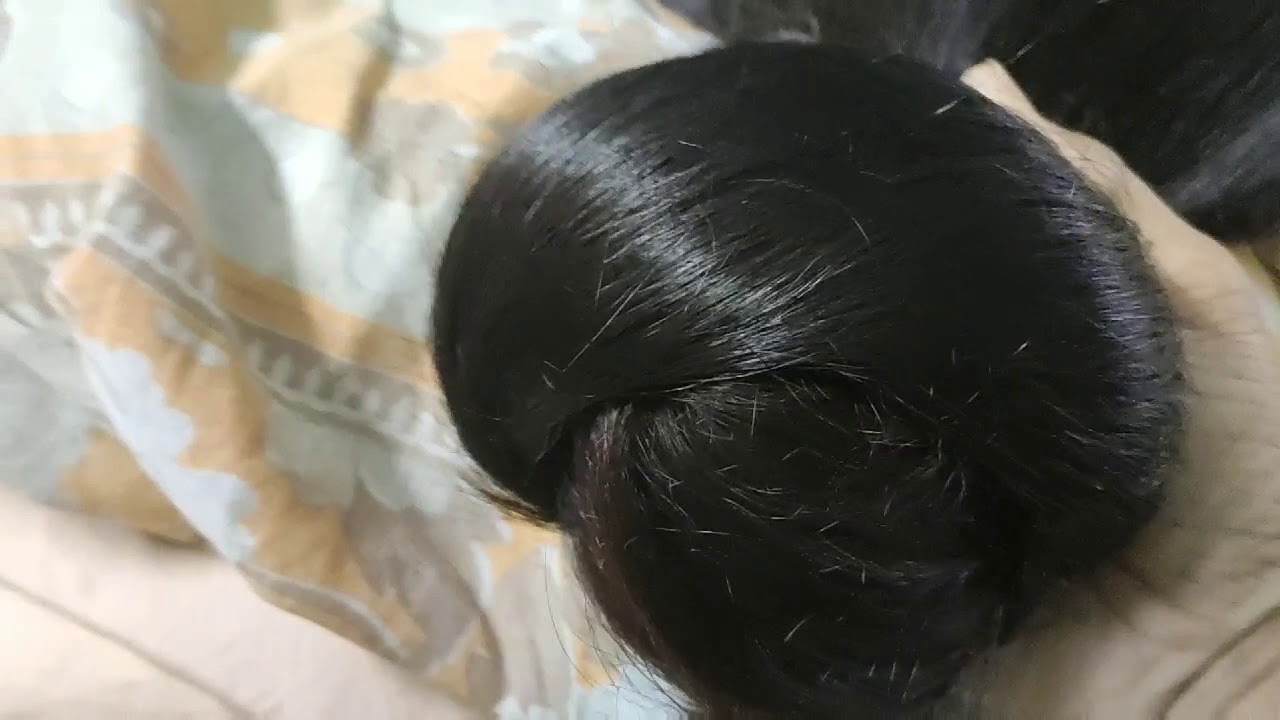 Long hair play. Bun and open long hair style.