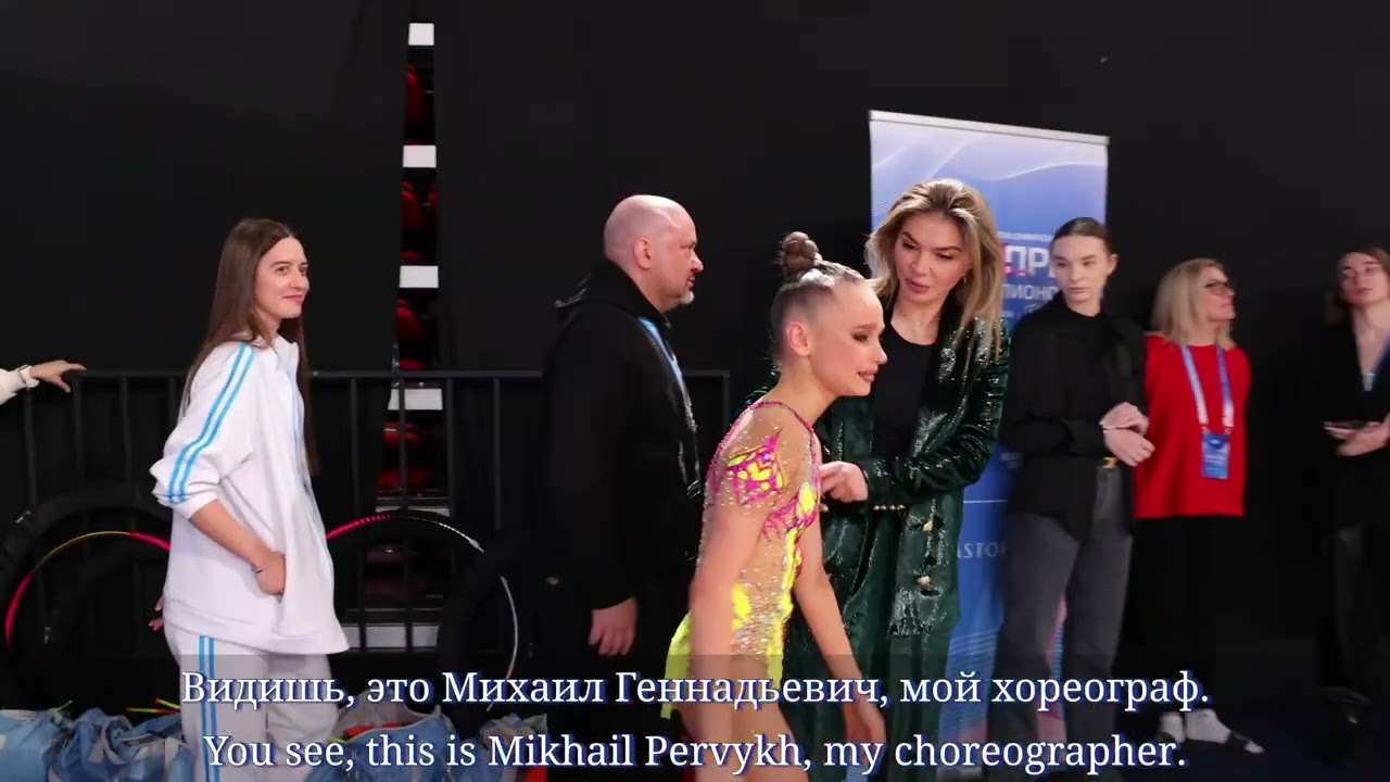 Alina Kabaeva consoling Yana Zaikina after not performing well at the finals