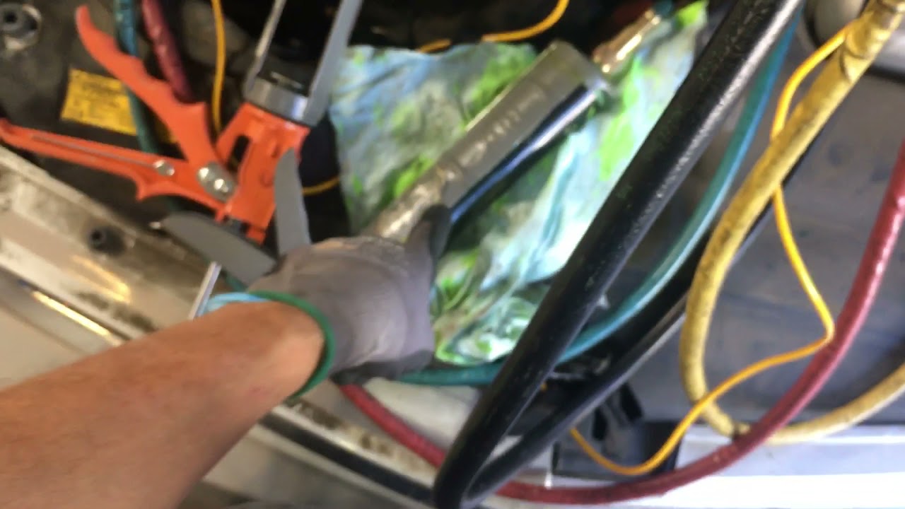 How Hot is the refrigerant compressor discharge temperature on a low refrigerant charge