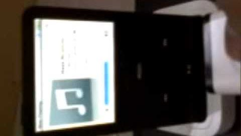 Ipod Video 80G in apple universal dock controlled by apple remote