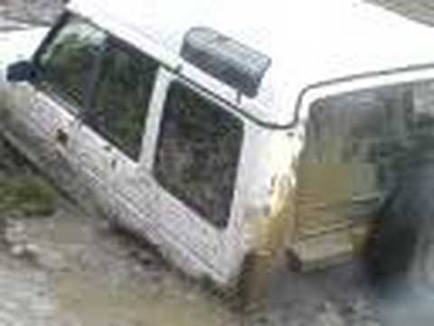 discovery stuck in water hole