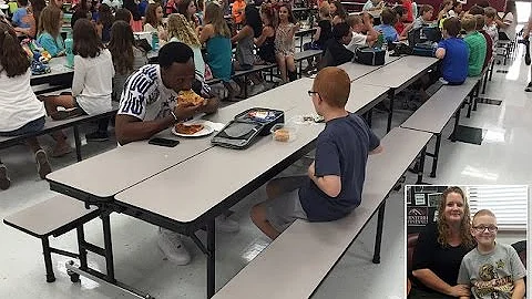 Touching moment Florida State University football player eats lunch with an autistic sixth grader
